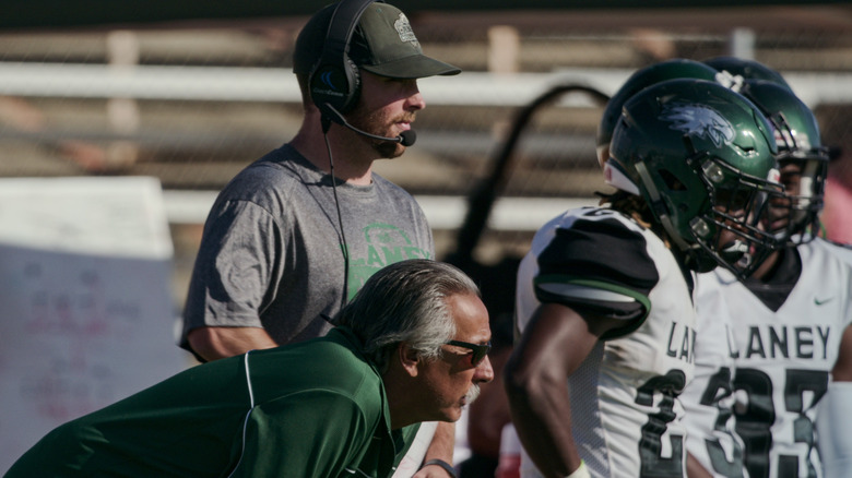 Coaching staff on field from Last Chance U