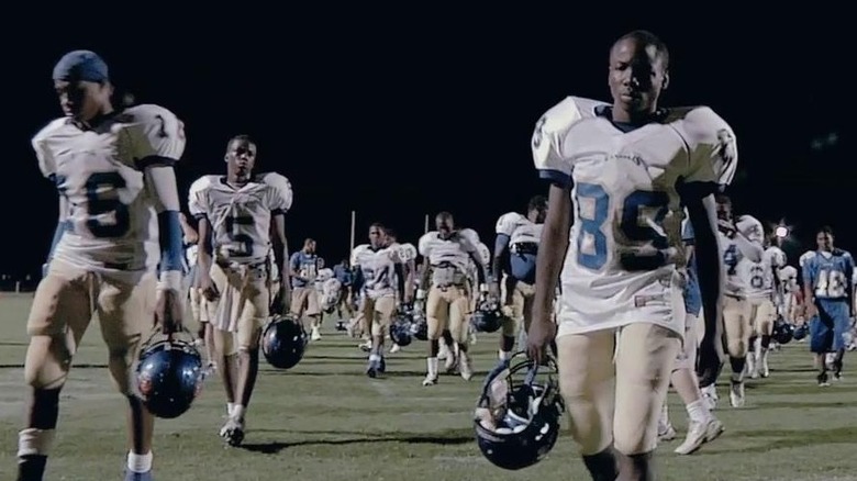 Football players on field from Undefeated