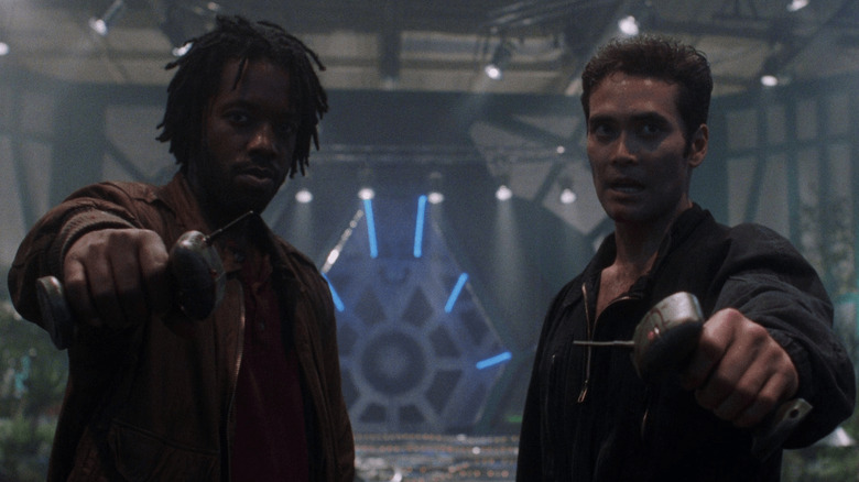 Kadeem Hardison and Mark Dacascos holding detonators