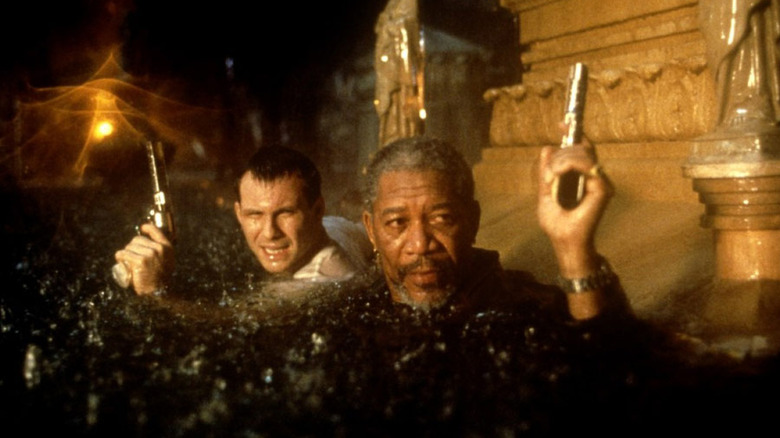 Christian Slater and Morgan Freeman wading through neck-high water