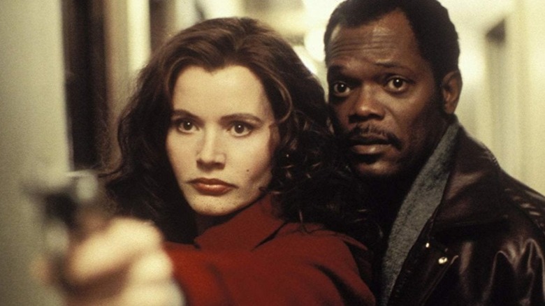 Geena Davis protecting Samuel L. Jackson