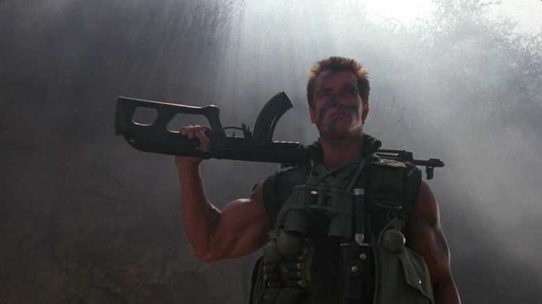 Arnold Schwarzenegger locked and loaded for war