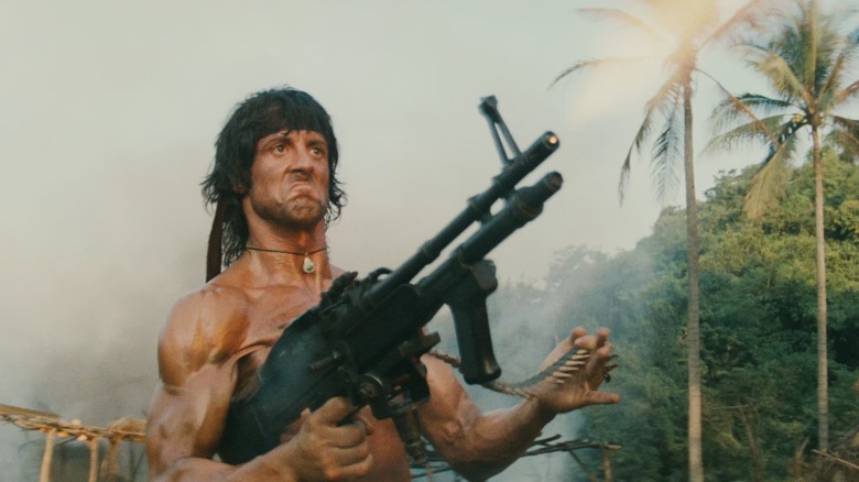 Sylvester Stallone blasting away with an M60 machine gun