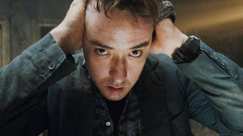 John Cusack as Mike Enslin