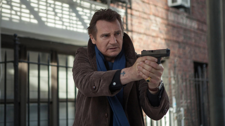 Liam Neeson pointing gun