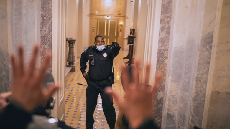 Officer blocks Capitol hallway