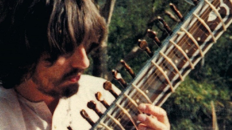 George Harrison playing sitar