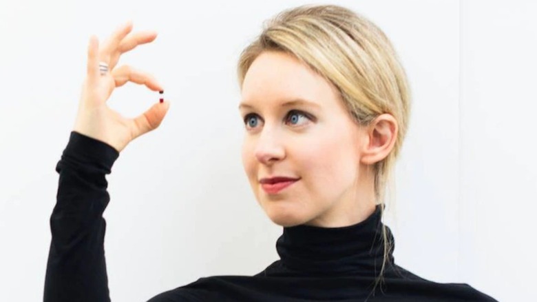 Elizabeth Holmes holding blood test