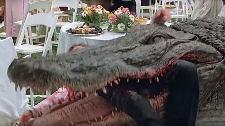 Alligator crashes wedding eats human