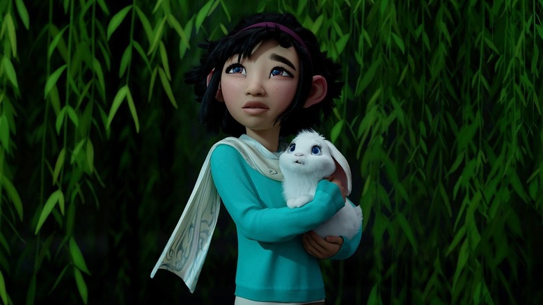 Fei Fei in "Over the Moon" holding rabbit