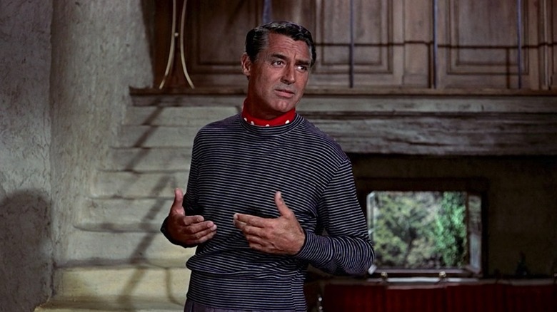 John Robie (Cary Grant) stands in his villa in To Catch a Thief