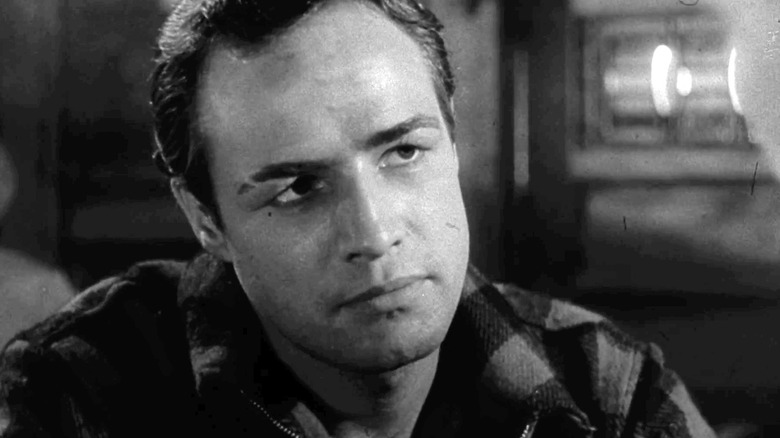 Terry Malloy (Marlon Brando) sits dejectedly in On the Waterfront