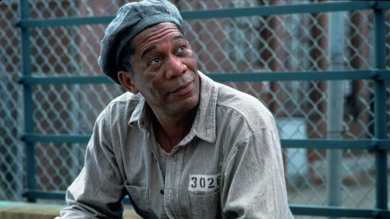 Red (Morgan Freeman) looks up from the prison yard in The Shawshank Redemption