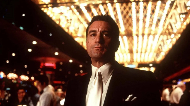 Ace Rothstein (Robert De Niro) stands sternly on the casino floor in Casino