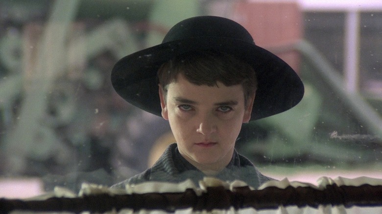 John Franklin as Isaac in Children of the Corn