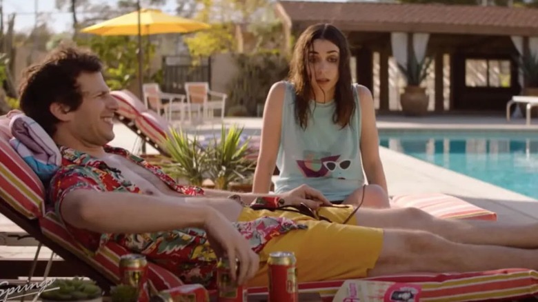 Nyles and Sarah sitting by pool