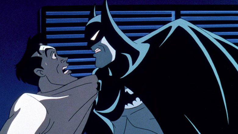 Batman interrogates a criminal in Mask of the Phantasm
