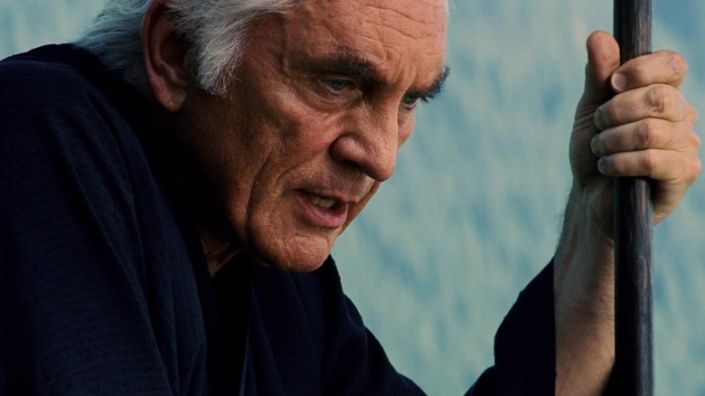 Terrence Stamp as Stick holding his staff in Elektra