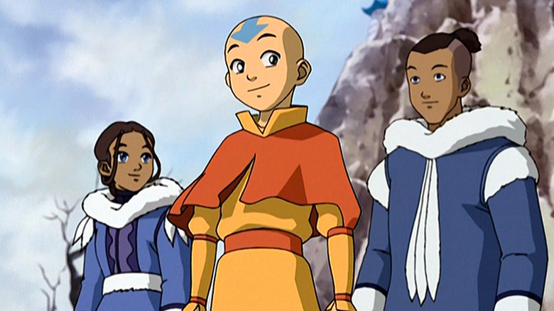 Aang smiling at Sokka and Katara on Avatar: The Last Airbender