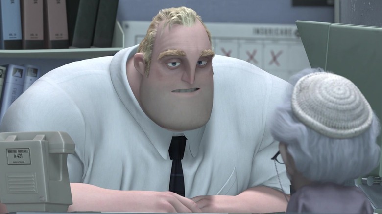 Bob Parr sitting at his desk in The Incredibles