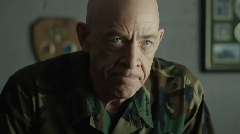 J. K. Simmons' Rear Admiral J. Levin looks angry as he leans in towards the camera in Renegades