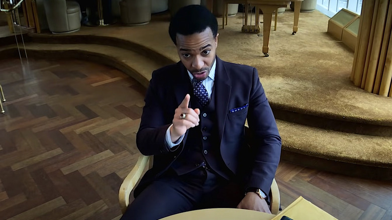 André Holland chair pointing High Flying Bird