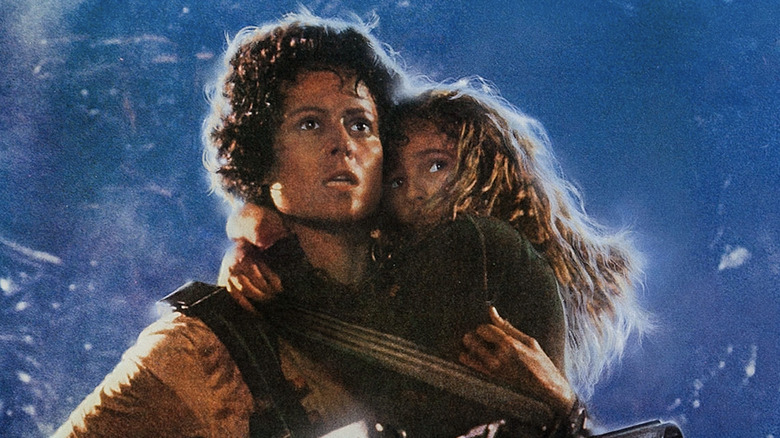 Ellen Ripley (Sigourney Weaver) and Newt (Carrie Henn) in James Cameron's Aliens