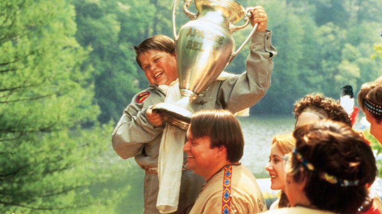 Aaron Schwartz as Gerry being held up with the Apache Relay trophy Tom McGown's Pat at the end of Heavyweights