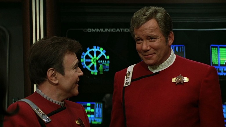 James Doohan's Scotty and William Shatner's Kirk standing on the Enterprise-B in Star Trek: Generations