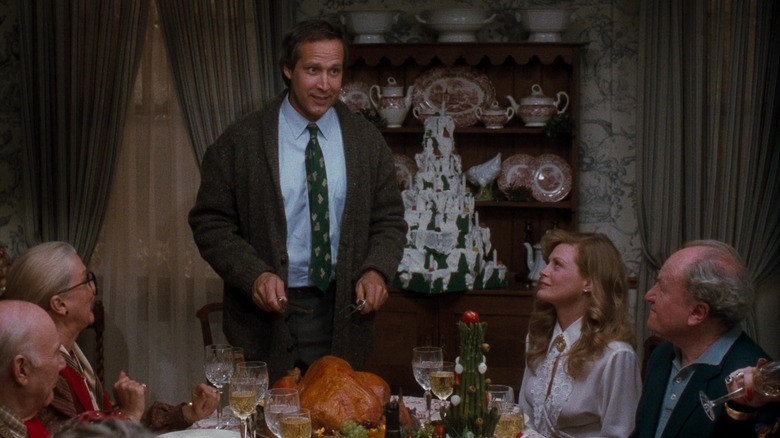 Chevy Chase as Clark Griswold carving the turkey in National Lampoon's Christmas Vacation