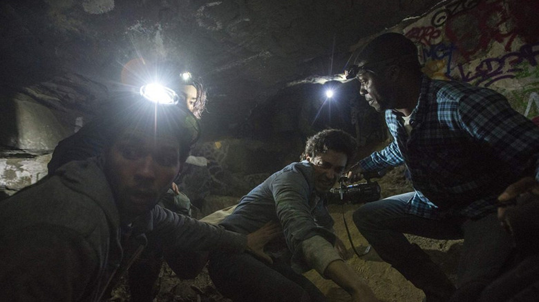 The cast navigates an underground danger in As Above, So Below (2014)