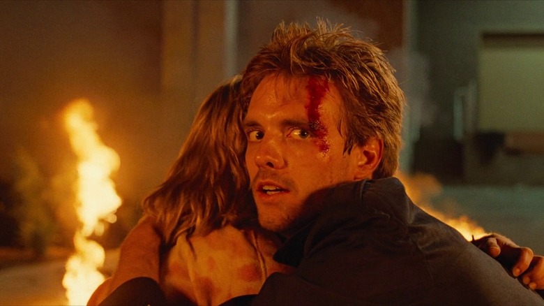 Kyle Reese hugging Sarah Connor in The Terminator