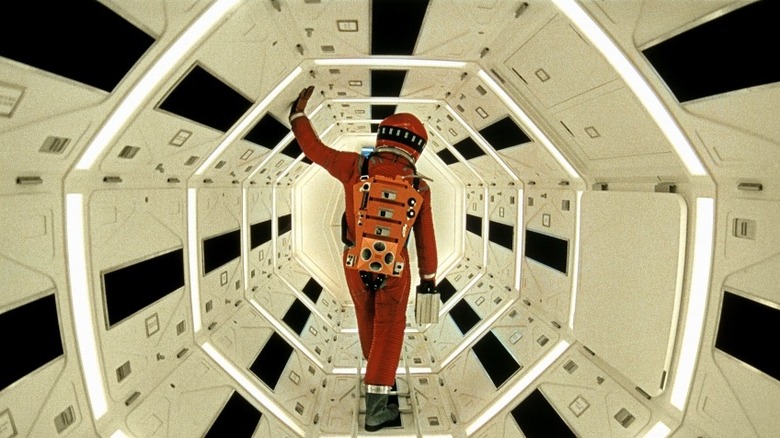 Astronaut in spaceship corridor