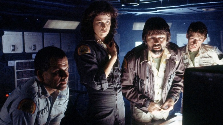 Nostromo crew looking at screen