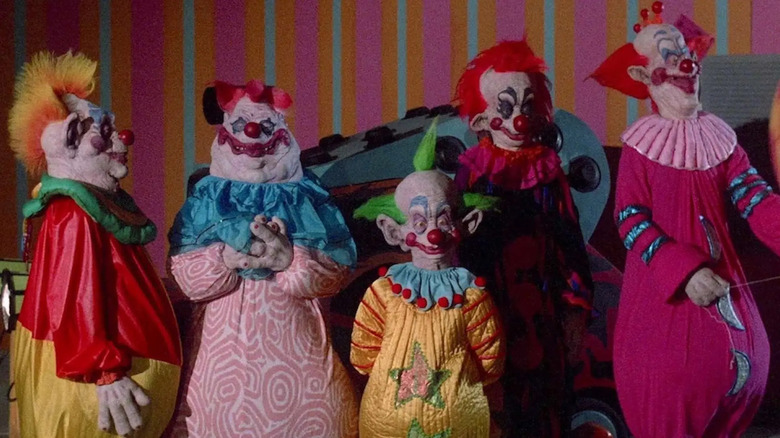 Killer Klowns standing together