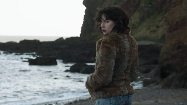 The Female standing on beach