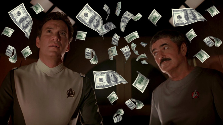 William Shatner's Kirk and James Doohan's Scotty watching the enterprise dock surrounded by money in Star Trek: The Motion Picture