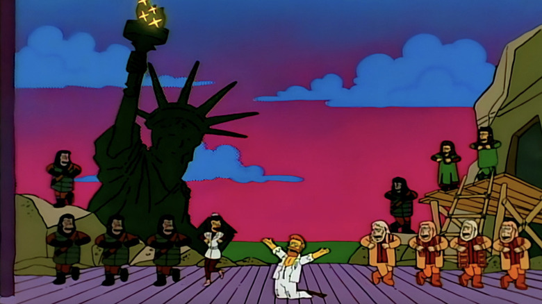 Troy McClure drops to his knees at the end of a Planet of the Apes musical in The Simpsons