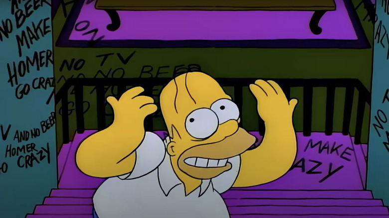 Homer Simpson looks crazed in the Shining parody from The Simpsons