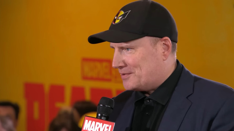 Kevin Feige being interviewed on the red carpet at the premiere of Deadpool & Wolverine