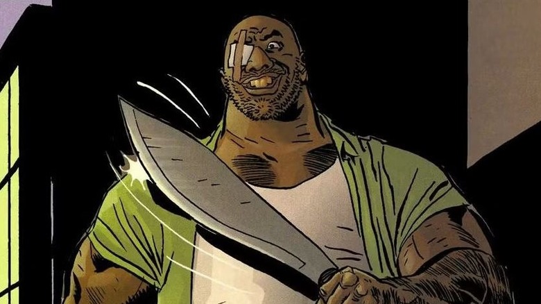 Barracuda smiling and wielding a machete