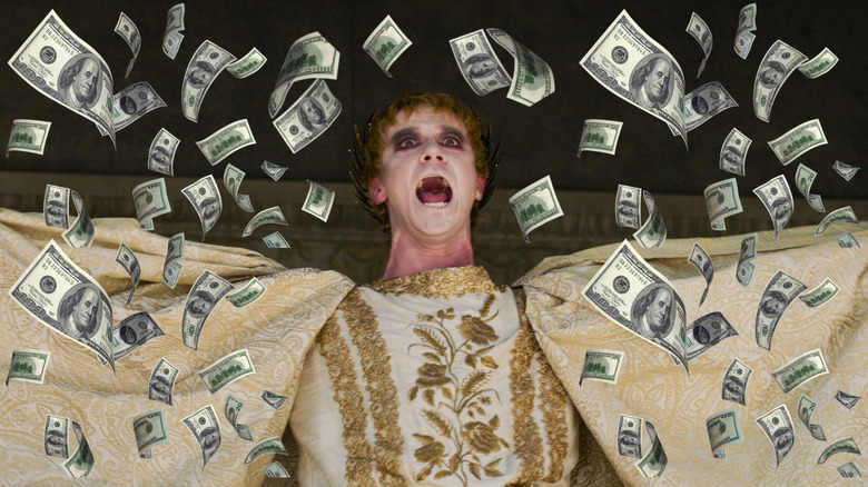 Joseph Quinn as Emperor Get yelling and surrounded by money from Gladiator II