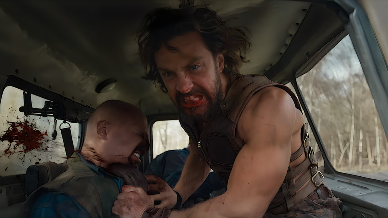 Aaron Taylor-Johnson as Kraven beating a guy to death in a van in Kraven the Hunter