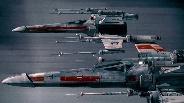 Two X-Wings flying down the Death Star trench in Star Wars: A New Hope