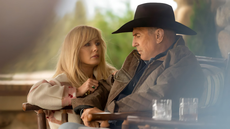 Beth and John Dutton sitting on the porch in Yellowstone