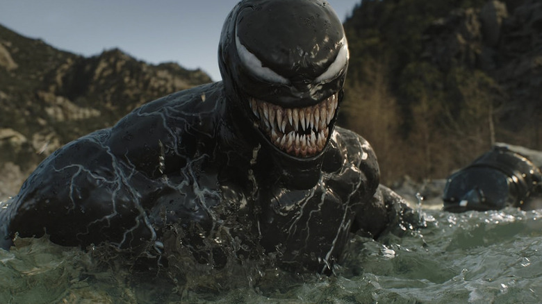 Venom smiling in the water in Venom: The Last Dance