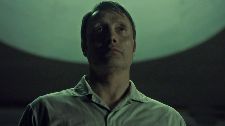 Mads Mikkelsen as Hannibal Lecter wearing a plain shirt in Hannibal