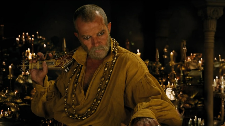 Antonio Banderas as King Rassouli surrounded by candles in Dolittle