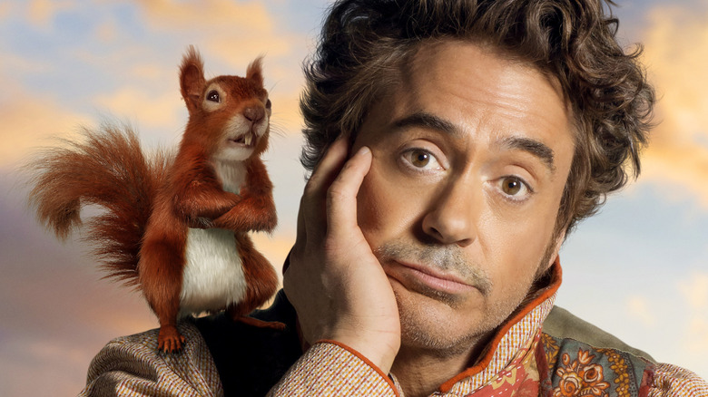 Craig Robinson as Kevin the squirrel with Robert Downey Jr.'s Doctor Dolittle on the poster for Dolittle