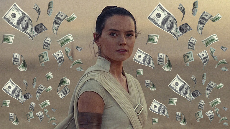 Daisy Ridley as Rey saying her name surrounded by money at the end of Star Wars: The Rise of Skywalker